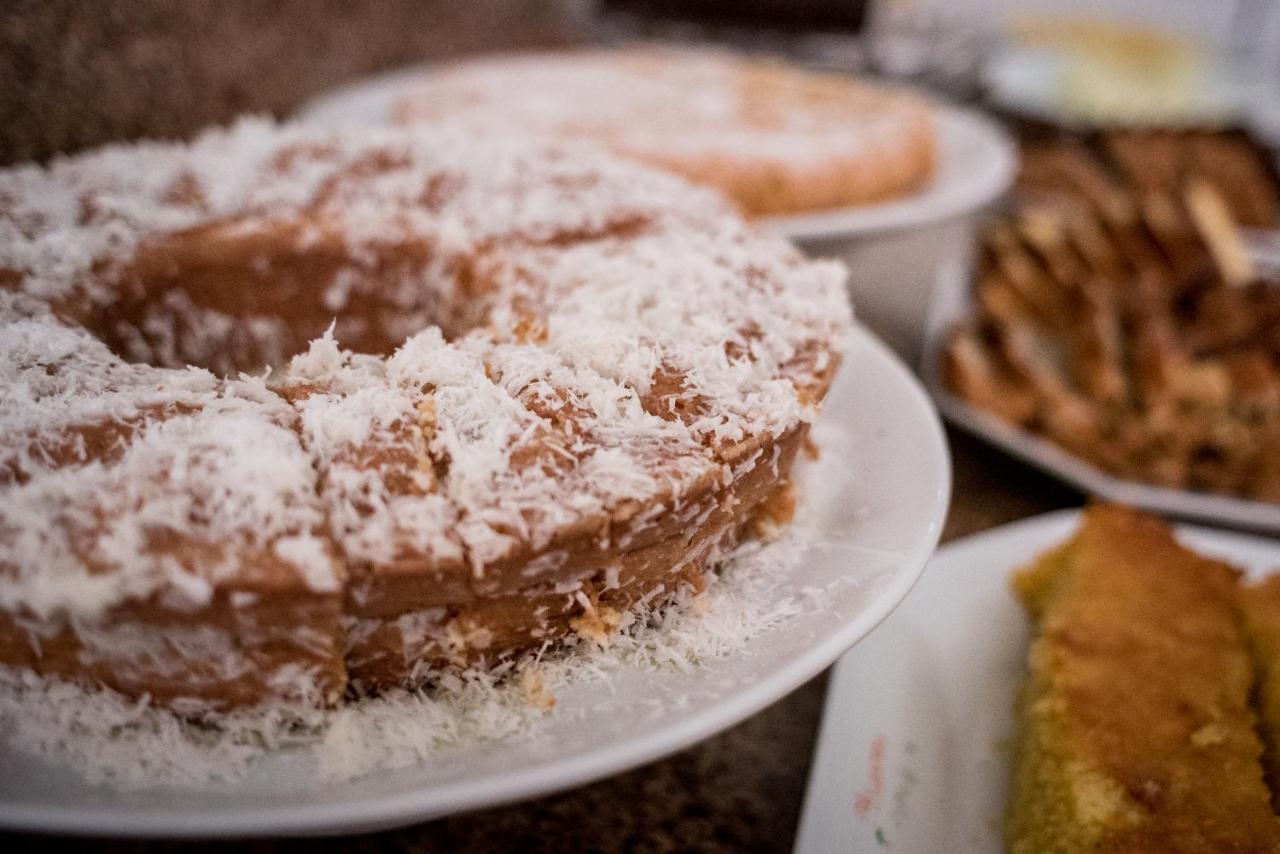 Holambra Garden Hotel Exterior photo A coconut cake
