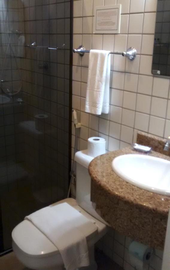 Holambra Garden Hotel Exterior photo A shower in a hotel bathroom